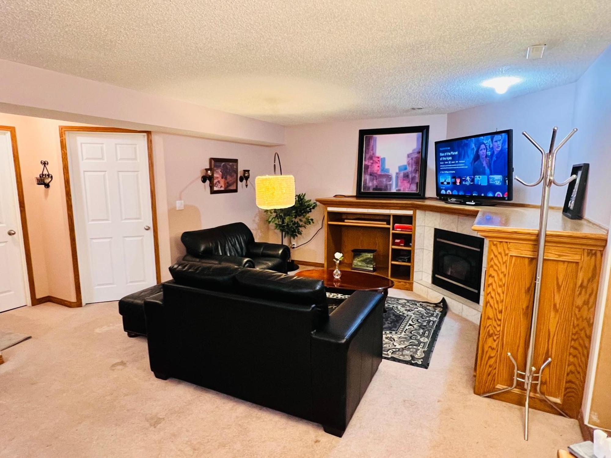 A Classic Homely Basement Suite! Chestermere Bagian luar foto