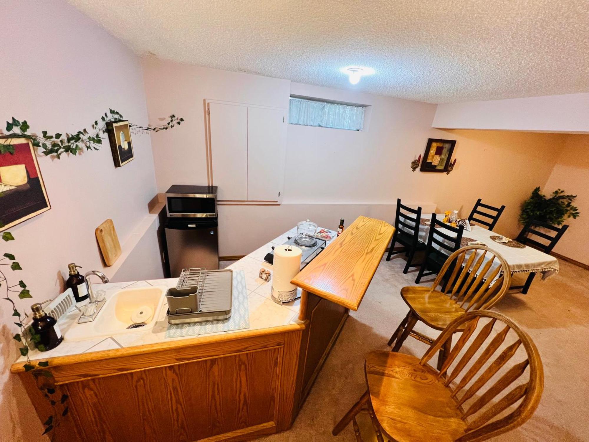 A Classic Homely Basement Suite! Chestermere Bagian luar foto